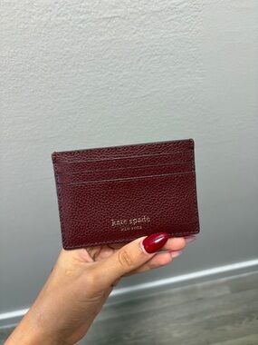 kate spade Burgundy Pebbled Leather Card Case with Gold Logo